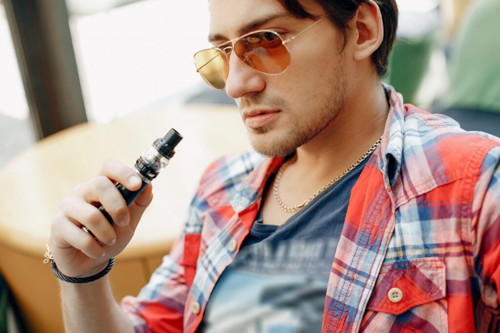 man using vape